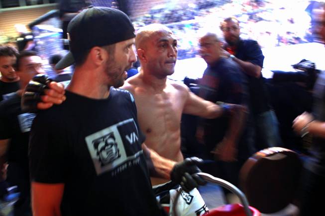 B.J. Penn exits the arena after being defeated by Frankie Edgar at "The Ultimate Fighter" 19 finale Sunday, July 6, 2014 at the Mandalay Bay Events Center.