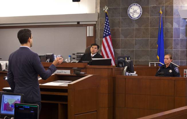 Deputy District Attorney Kenneth Portz addresses the court during the trial for Joey Kadmiri at the Regional Justice Center on  Tuesday, July 8, 2014.