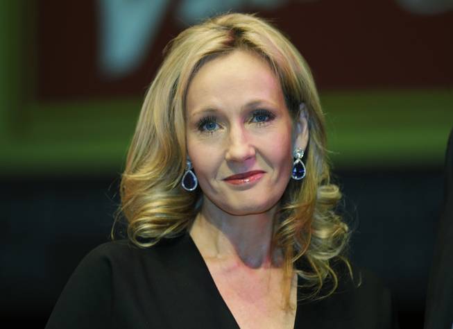 In this Thursday, Sept. 27, 2012, file photo, British author J.K. Rowling poses for photographers at the Southbank Centre in London.