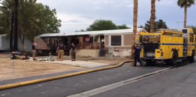 Two people, an adult and a child, suffered minor smoke inhalation when this mobile home at a park in the 800 block of Lamb Boulevard caught fire Thursday, July 10, 2014, Las Vegas Fire & Rescue officials said.