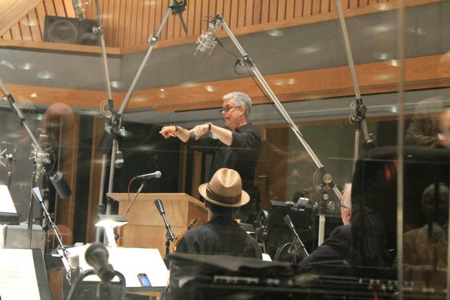Grammy Award winner Gregg Field directs Clint Holmes and members of the Count Basie Orchestra in recording an upcoming album in Studio A, aka the “Grammy Studio,” at Capitol Records on Thursday, July 10, 2014, in Los Angeles.
