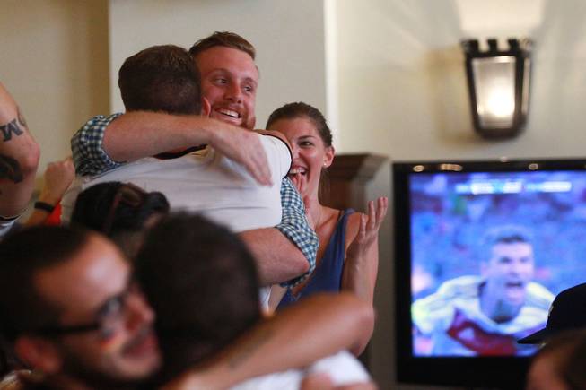 While watching the World Cup final game at the Hofbrauhaus, Germany fans react as they go up 1-0 in extra time against Argentina Sunday, July 13, 2014.