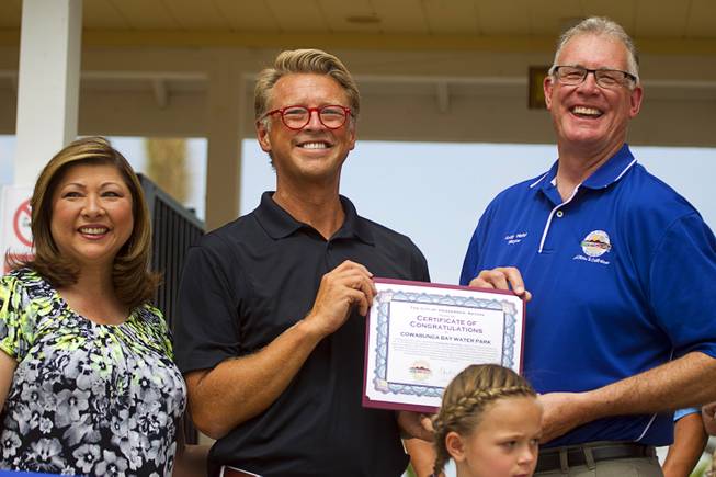 Shane Huish, general manager of the Cowbunga Bay water park, poses with Henderson City Councilwoman Gerri Schroder, left, and Henderson Mayor Andy Hafen during an official opening ceremony for the water park in Henderson Monday, July 14, 2014. The park opened on July 4. STEVE MARCUS