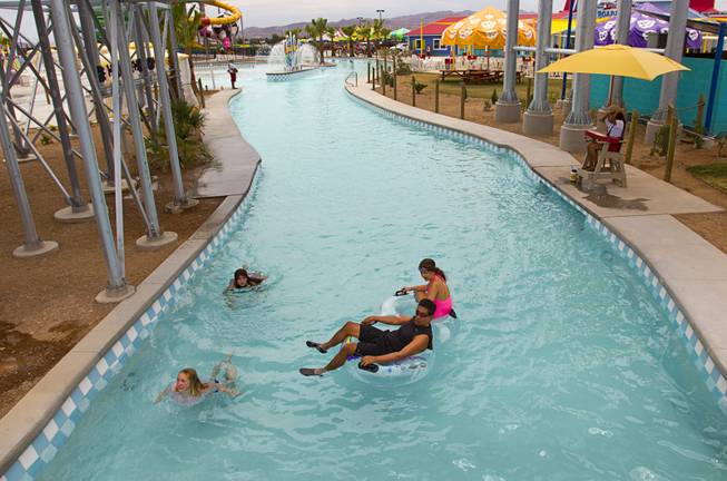 People float on a lazy river at the Cowbunga Bay water park in Henderson Monday, July 14, 2014. The new water park opened on July 4. STEVE MARCUS