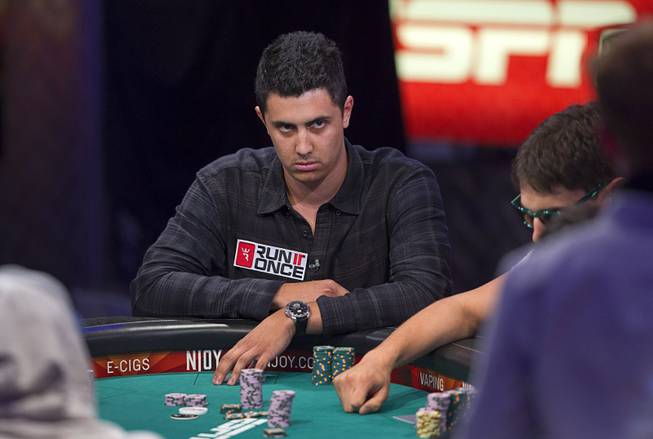 Craig McCorkell of Britain competes during the World Series of Poker $10,000 buy-in No-limit Texas Hold 'em main event at the Rio Monday, July 14, 2014. McCorkell finished in 13th place.
