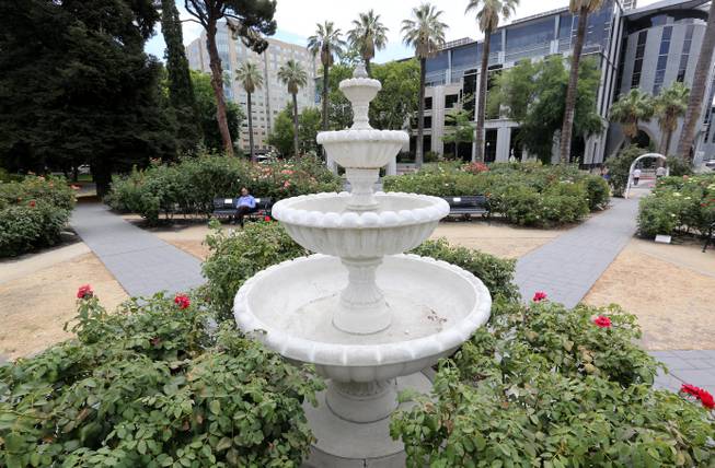 The fountain at the Capitol Park Rose Garden sits empty, Tuesday, July 8, 2014, in Sacramento, Calif. State water regulators are considering fines up to $500 to enforce emergency restrictions on urban water use like irrigating lawns and car washing due to the state's severe drought, because conservation efforts so far aren't producing enough results.