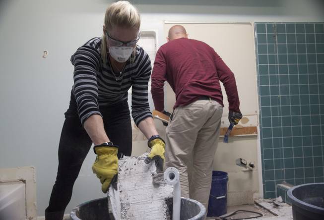 Interior designer Melissa Roche of Las Vegas competes in Season 2 of “Brother vs. Brother” on HGTV. Roche and Eric Eremita start demolition in the master bathroom of the Lousteau home in the West Hills neighborhood of Los Angeles. Roche, part of Team Drew, was crowned the champion on the finale Sunday, July 13, 2014.

