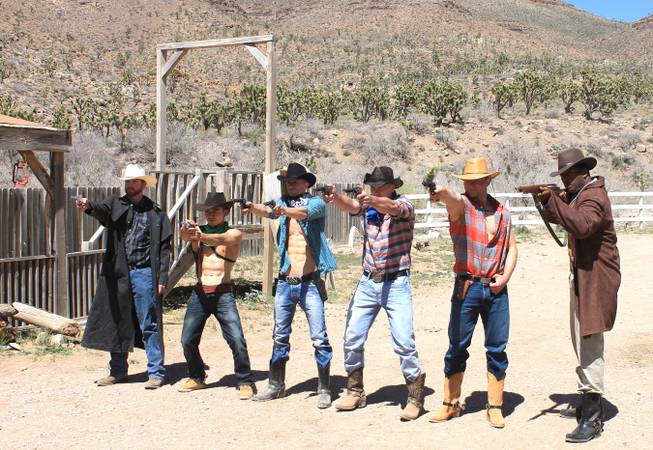 The "Absinthe" Cowboys, from left, Jake Alberda, Ming Hukari, Misha "10 Pack" Furmanczyk, Sergie Matvienko, Lucasz Sczerba and Kyle Vonn Elzey during the video shoot for Melody Sweets' "Shoot 'em Up" at Grand Canyon Ranch on April 22, 2014.