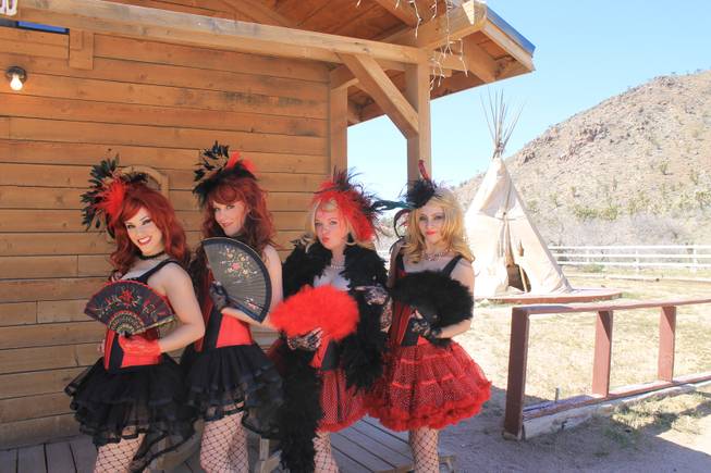 A lineup of showgirls, from left, Leah Christiana Gonzalez, Alexa Hukari, Katerina Matvienko and Marta Szczerba, during the video shoot for Melody Sweets' "Shoot 'em Up" at Grand Canyon Ranch on April 22, 2014.