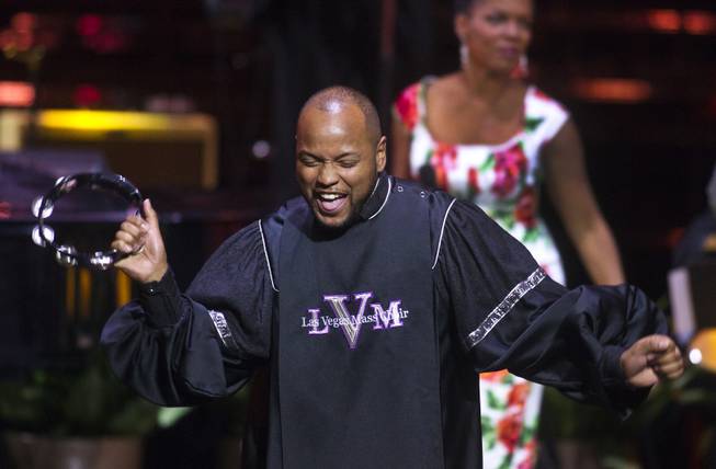 A member of the Las Vegas Mass Choir performs for the crowd during The Venetian Las Vegas announcement event for the engagement of "Georgia On My Mind: The Music of Ray Charles" on Tuesday, July 22, 2014.