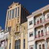 This Dec. 27, 2013, photo shows the exterior of Caesars Atlantic City in Atlantic City N.J., with the Wild West facades of Bally's Atlantic City in the foreground. 