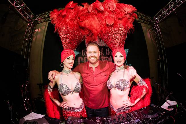 DJ Ikon with Las Vegas Showgirls at Tales of the Cocktail  at the Masquerade Nightclub inside Harrahs New Orleans on Thursday, July 17, 2014.