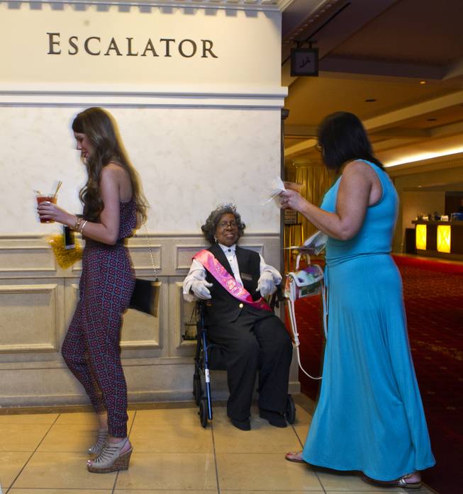 Colosseum usher Dorothy Brooks greets and directs show attendees before the Shania show at Caesars Palace on Wednesday, July 23, 2014.  Brooks turned 90 today and was thrown a birthday party there before opening for the evening.
