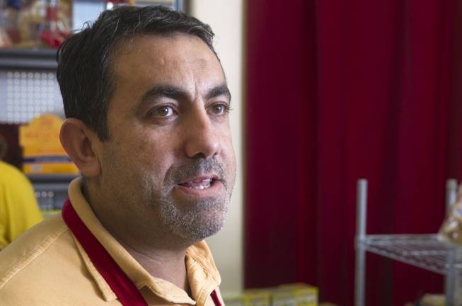 Business owner Abdul Nasser Karouni has been waiting since 2012 to become a U.S. citizen.