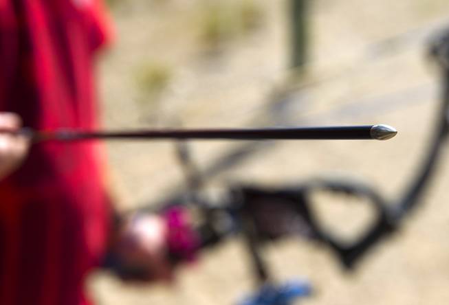 Jeremy Beard displays an arrow with a tungsten point at the Las Vegas Archers Spring Mountain Range near Mountain Springs Sunday, July 20, 2014.