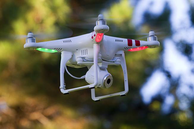 Earl Brown's DJI Phantom 2 Vision quadcopter drone is shown during a flight at The Hills Park in Summerlin Thursday, July 24, 2014.  Brown turned to Craigslist after losing the drone on a flight earlier in the month.