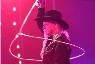 Rope-trick artist Chris McDaniel performs in Melody Sweets’ video-release party for the music video 