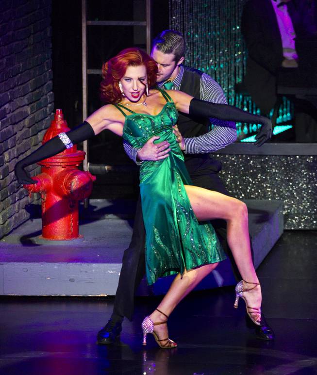 Principal dancer Tara Palsha performs her main number with Josh Strickland during her final night in "Vegas! The Show' on Friday, July 25, 2014.