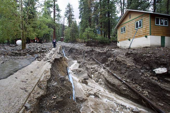 A view of Rainbow Canyon Boulevard in the Rainbow Subdivision on Mt. Charleston Monday, July 28, 2014. The neighborhood was hit hard by flooding and debris in runoff last year as well.