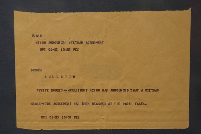 A Teletype bulletin announcing the Vietnam Cease-Fire is on display at the "Every Age is an Information Age" exhibit at the Nevada State Museum, Friday July 25, 2014. The exhibit shows 150 years of communication technology in Nevada.