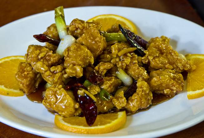 Orange Chicken dish by Chef Ivo Karkaliev now cooking Chinese food for the Cafe Fiesta at Fiesta Henderson on Monday, July 28, 2014.