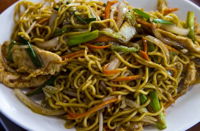 Chicken Chow Mein dish by Chef Ivo Karkaliev now cooking Chinese food for the Cafe Fiesta at Fiesta Henderson on Monday, July 28, 2014.