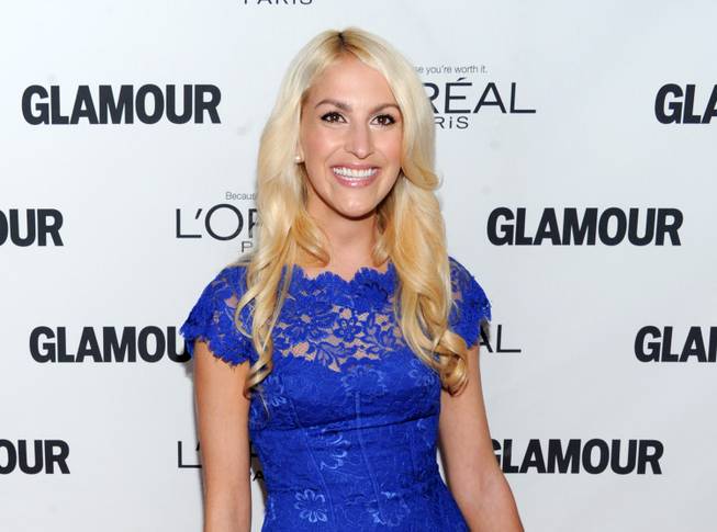 This Nov. 11, 2013,  file photo shows honoree Kaitlin Roig-DeBellis attending the 23rd Annual Glamour Women of the Year Awards at Carnegie Hall in New York. Roig-DeBellis, a teacher at Sandy Hook Elementary School who helped save students' lives during a mass shooting, has a book deal. G.P. Putnam's Sons for "Choosing Hope: Moving Forward from Your Life's Darkest Hour." The book will be released in the spring of 2015.