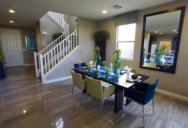 A dining area is shown in a two-story plan 2568 model home at KB Homes' Tevare residential development in Summerlin Wednesday, July 30, 2014.