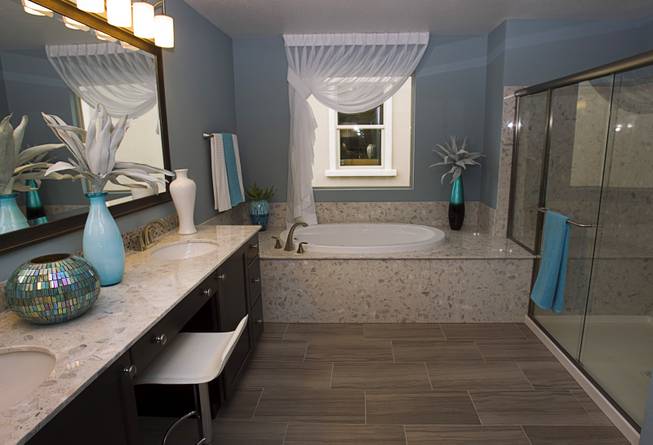 The master bathroom is shown in a two-story plan 2568 model home at KB Homes' Tevare residential development in Summerlin Wednesday, July 30, 2014.