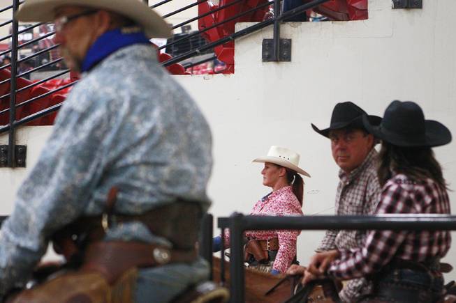 Cowboys and cowgirls wait to compete during the Cowboy Mounted Shooting Association's Western U.S. ChampionshipThursday, July 31, 2014 at the South Point.