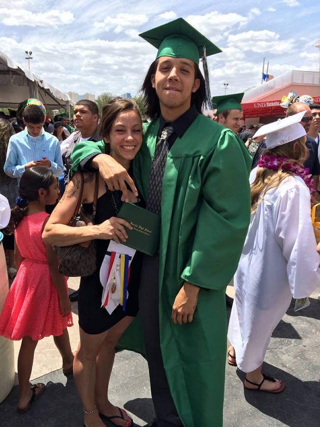 Antonio Bellows poses with a friend after Rancho High School's graduation ceremony.