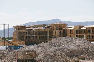 Construction continues on an apartment complex behind Whole Foods at the District at Green Valley Ranch in Henderson on July 31, 2014.
