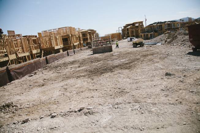 Construction continues on an apartment complex behind Whole Foods at the District at Green Valley Ranch in Henderson on July 31, 2014.