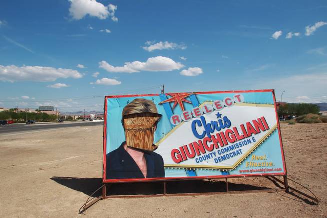 A campaign sign for Clark County Commissioner Chris Giunchigliani is seen defaced as it sits along Boulder Highway July 29, 2014.