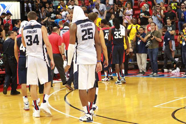 Andre Drummond looks back while heading to the locker room after their  2014 USA Basketball Showcase was called off after Paul George fractured his leg Friday, Aug. 1, 2014 at the Thomas & Mack Center.