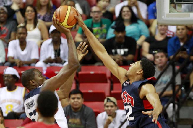 Anthony Davis blocks a shot by Kevin Durant during the 2014 USA Basketball Showcase Friday, Aug. 1, 2014 at the Thomas & Mack Center.