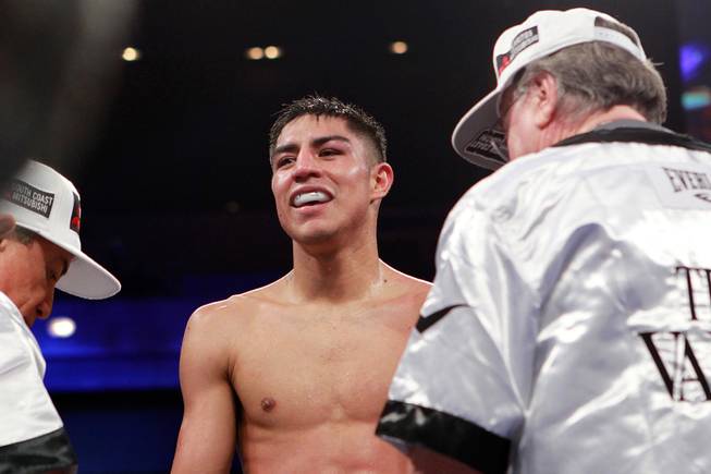Jessie Vargas smiles after his WBA light welterweight title fight against Anton Novikov Saturday, Aug. 2, 2014 at the Cosmopolitan. Vargas won by decision.