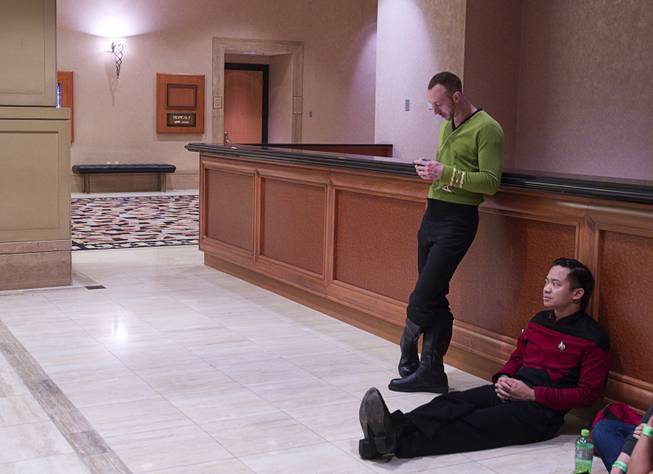 Trekkies take a rest and check emails during the final day of the 13th annual Official Star Trek Convention at the Rio Sunday, Aug. 3, 2014.