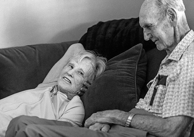 In this July 2014 photo provided by their granddaughter Melissa Stone, Don Simpson, 90, and his wife Maxine, 87, share time together in Sloan's home in Bakersfield, Calif. The couple, married 62 years, died four hours apart July 21, 2014, while lying next to each other, their family said.