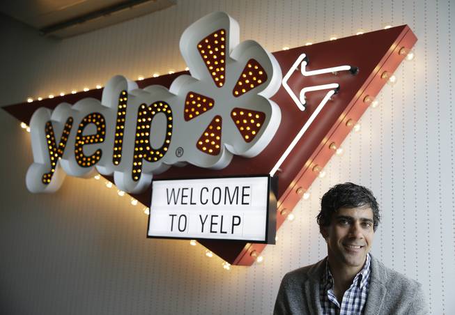 In this photo taken Friday, Aug. 1, 2014, Yelp CEO Jeremy Stoppelman poses at his company's headquarters in San Francisco.