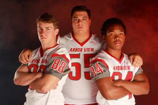 Arbor View High School football players Mitchell Durkee, Malik Noshi and Herman Gray on Monday,  July 21, 2014.