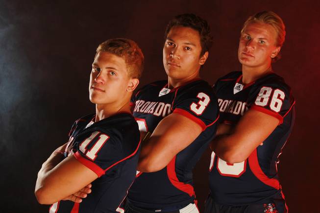 From left, Coronado High School football  players Tanner Gorski, Jordan Rude and Justin Belknap July 21, 2014.