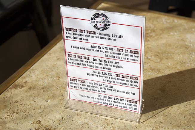 A beer menu is displayed on a table at Bad Beat Brewing, 7380 Eastgate Rd., a brewery in Henderson's "Booze District," Thursday, August 7, 2014.
