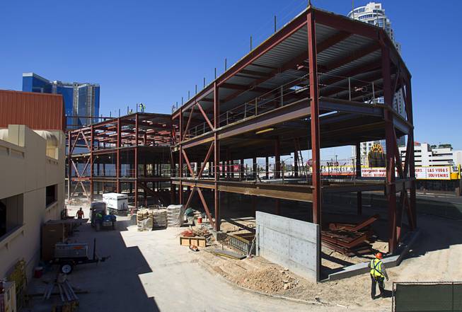 Construction continues on a building at the northeast corner of Sahara Avenue and Las Vegas Boulevard South Thursday, August 7, 2014. A Walgreens will occupy about half of the first floor. Wilger Enterprises is the general contractor on the project.