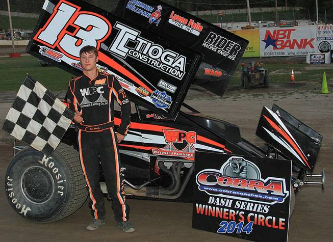 This July 5, 2014, photo provided by Empire Super Sprints, Inc., shows sprint car driver Kevin Ward Jr., in the victory lane with his car at the Fulton Speedway in Fulton, N.Y.