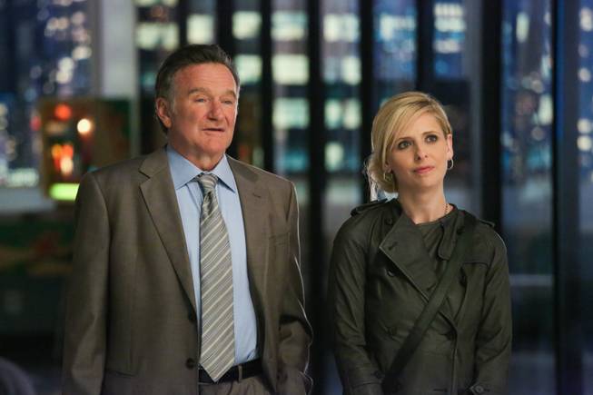 Robin Williams and Sarah Michelle Gellar in a scene from the pilot episode of "The Crazy Ones" on CBS.