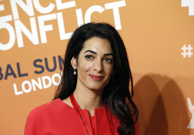 Amal Alamuddin, human rights lawyer and fiancee of actor George Clooney, attends the "End Sexual Violence in Conflict" summit in London, June 12, 2014. Alamuddin has pulled out of an appointment to serve on the U.N.'s three-member commission of inquiry looking into possible violations of the rules of war in Gaza. 