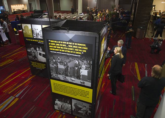 A multi-media exhibition commemorating the 1964 Beatles concert in Las Vegas is displayed during a news conference in the lobby of the Las Vegas Convention Center Tuesday, Aug. 12, 2014. The exhibition will be on display in the lobby of the LVCC through Oct. 27.
