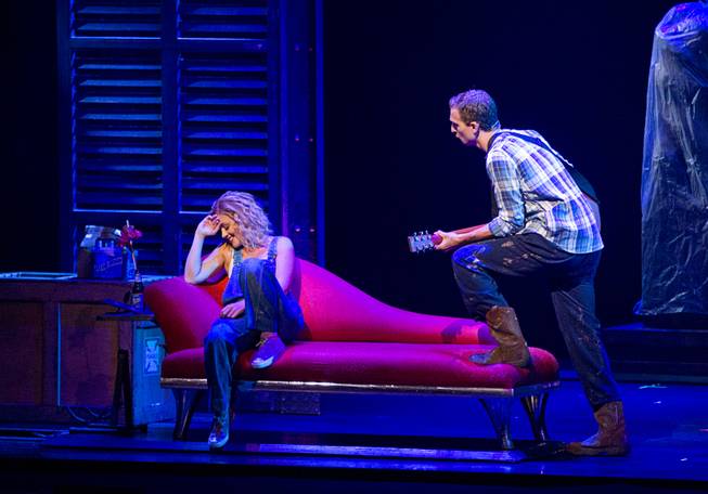 Molly (Katie Postotnik) is serenaded by Sam (Steven Grant Douglas) in their new apartment during “Ghost The Musical” at the Smith Center for the Performing Arts on Wednesday, Aug. 13, 2014, in downtown Las Vegas.