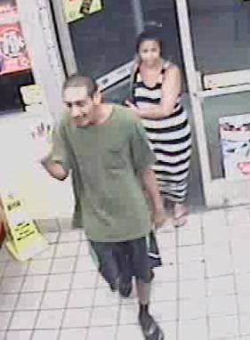 Metro Police identified this man and woman as suspects in the robbery of a motorist near Harmon Avenue and Spencer Street on Aug. 5, 2014.